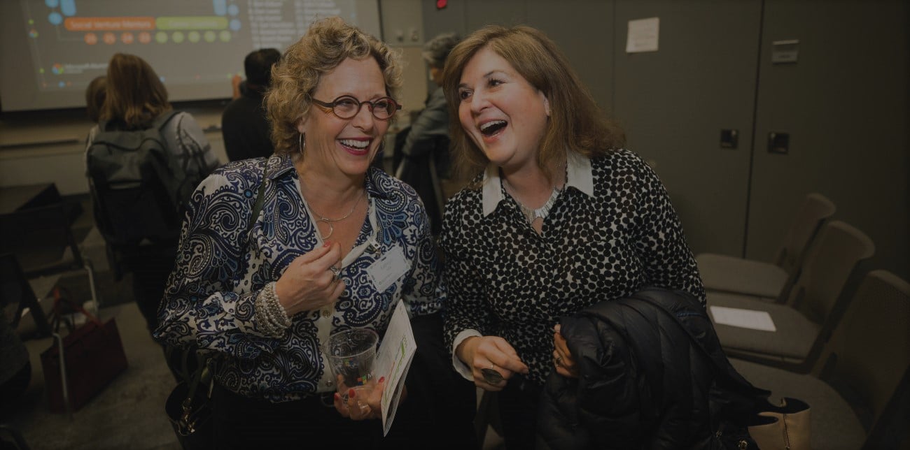 Two women laughing
